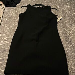 NWT black dress, great for any occasion. Size 8 Petite.